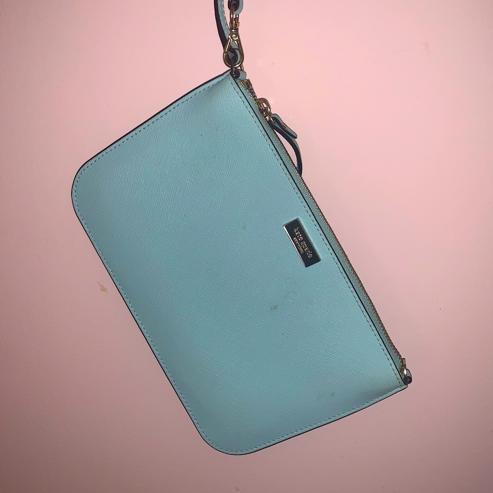 USED ONCE BABY BLUE KATE SPADE WRISTLET